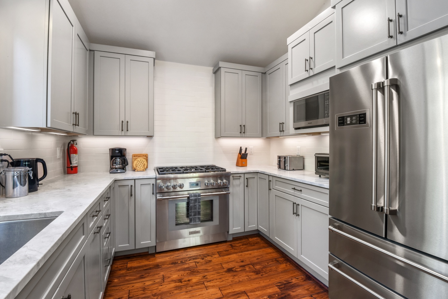 Full kitchen with stainless-steel appliances