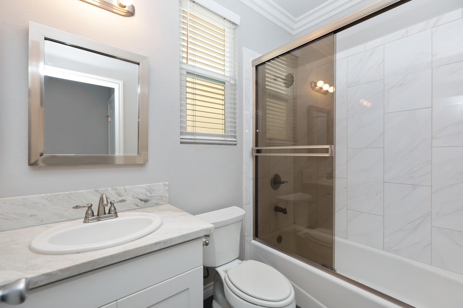 The second full bath offers a single vanity & shower/tub combo