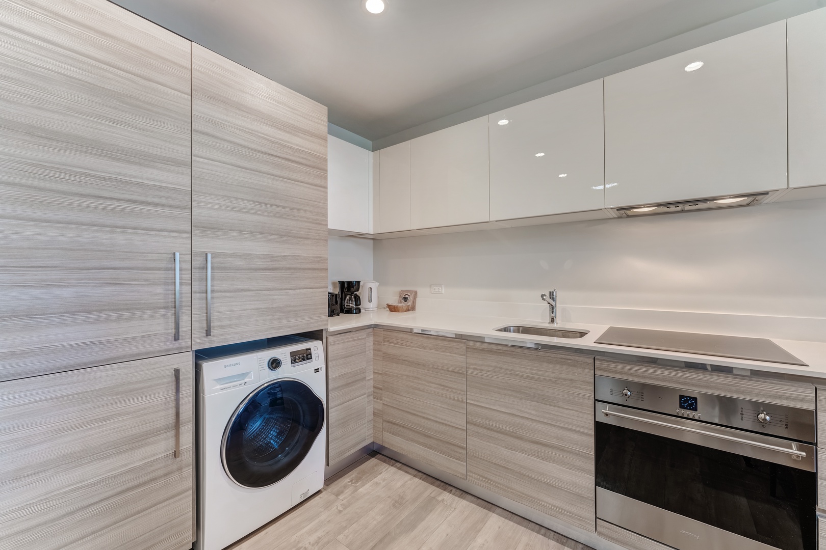 A private washer is available for your stay, tucked away in the kitchen