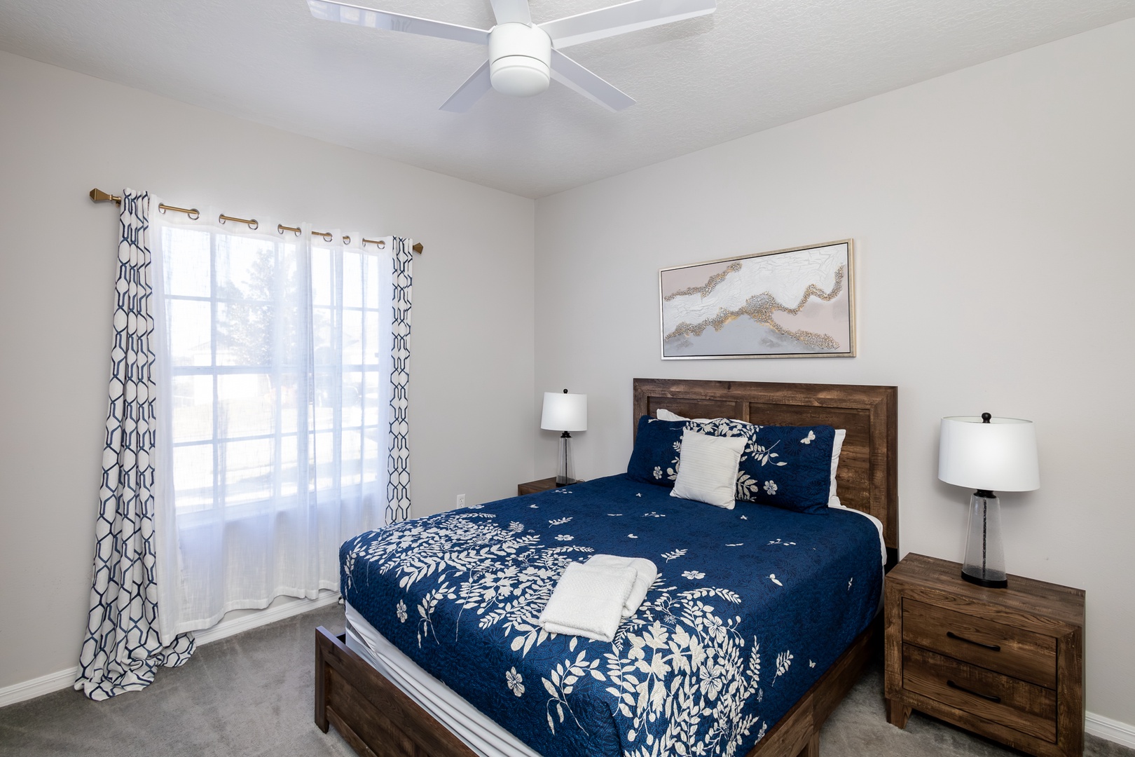 The comfy queen suite features a private ensuite and ceiling fan