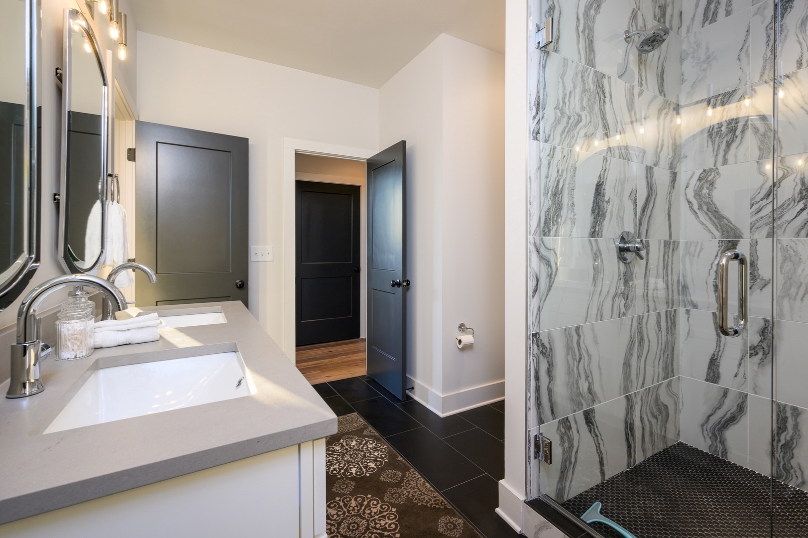 Master bedroom en suite with dual sinks & stand up shower