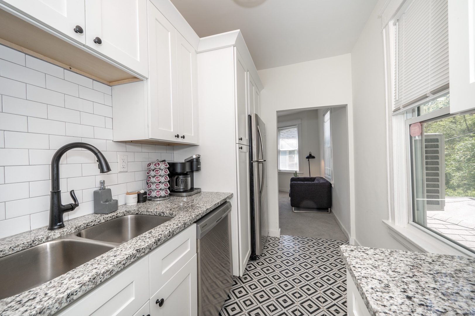 Apt 2 – The modern kitchen offers ample storage & all the comforts of home
