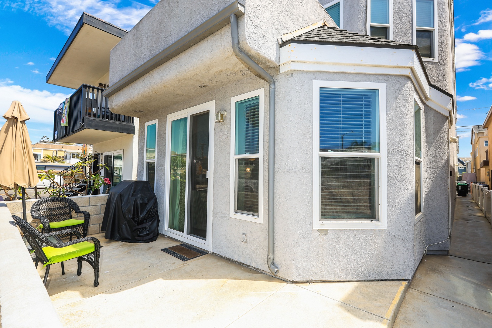 Lounge the day away in the fresh air on the sunny patio