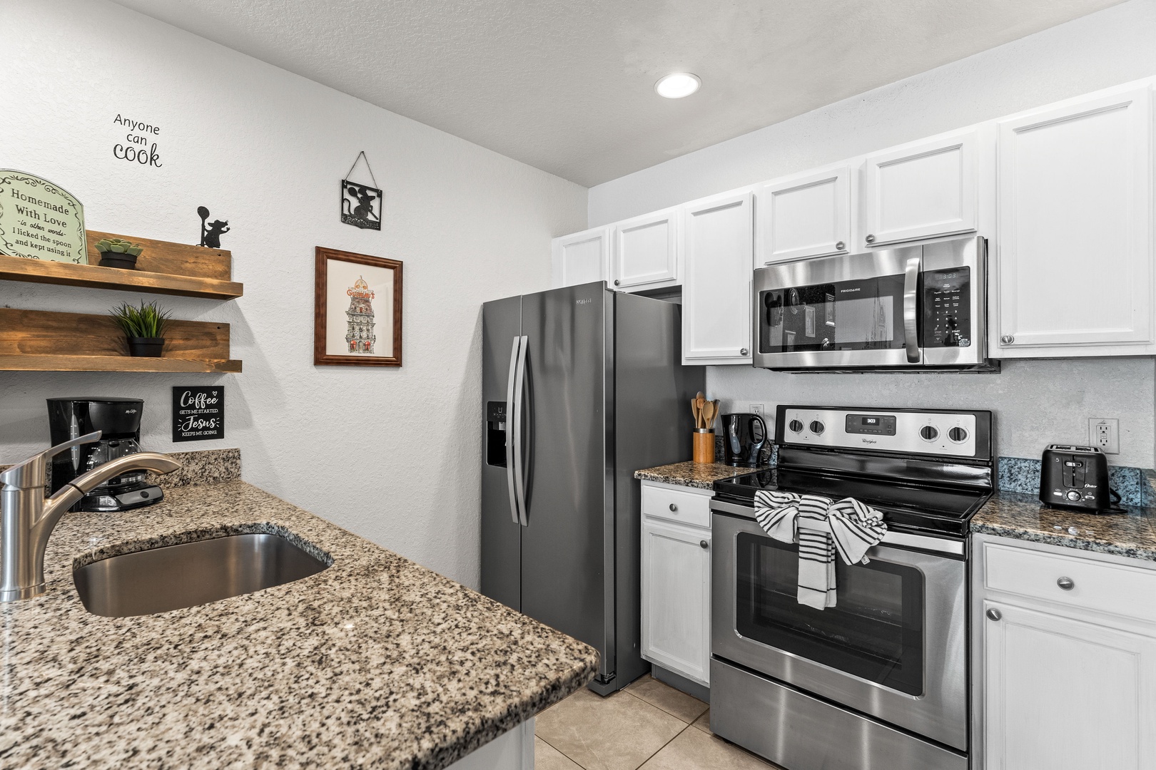 The open, airy kitchen offers ample space & all the comforts of home