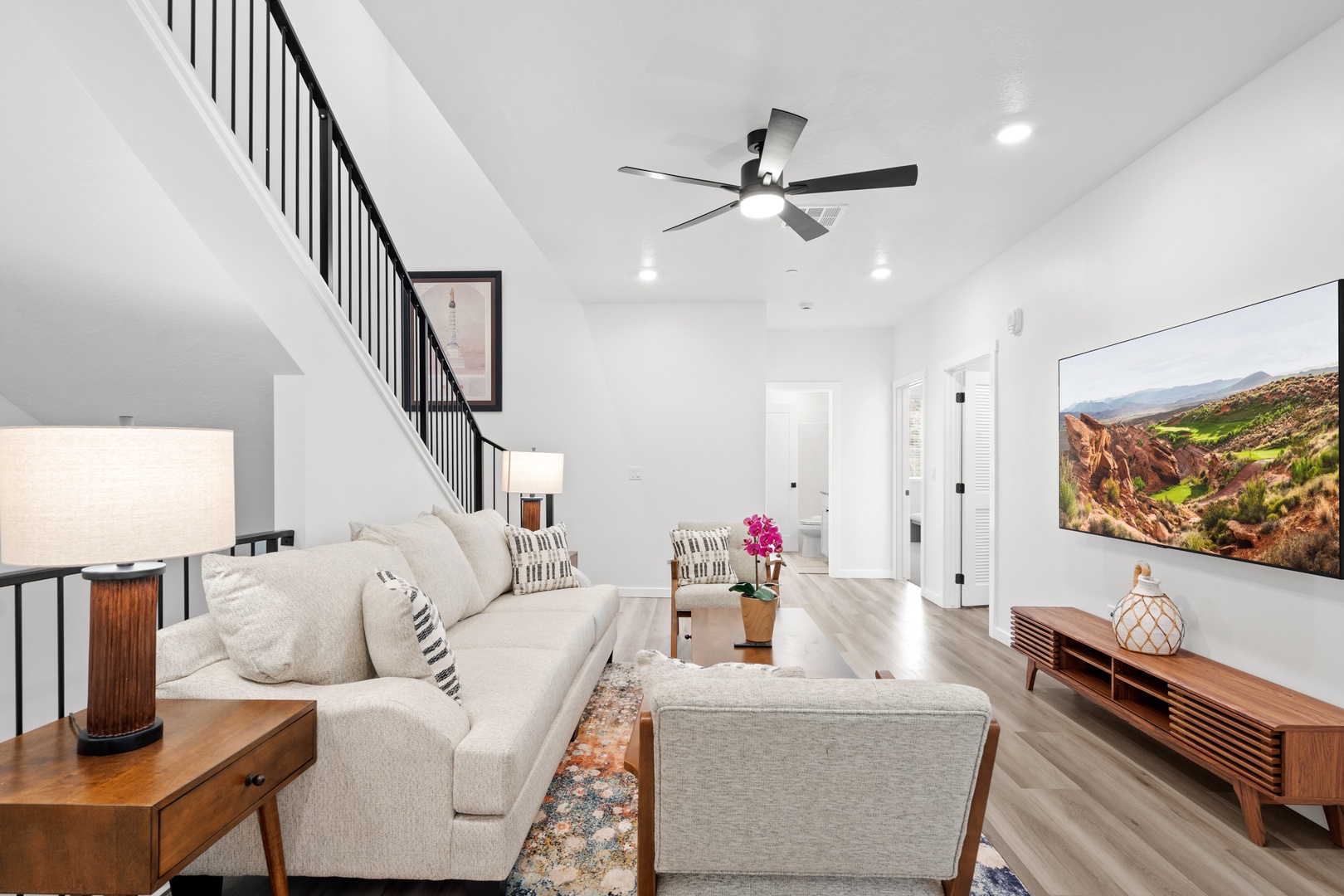 Kick back & relax in the 2nd-floor den, with its own smart TV & ceiling fan