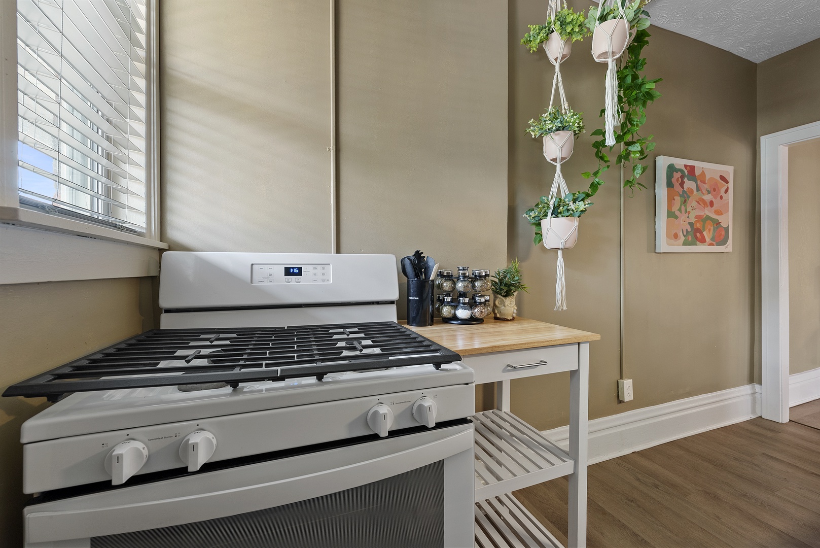 Apartment 1164.5’s breezy kitchen offers loads of storage space & every home comfort