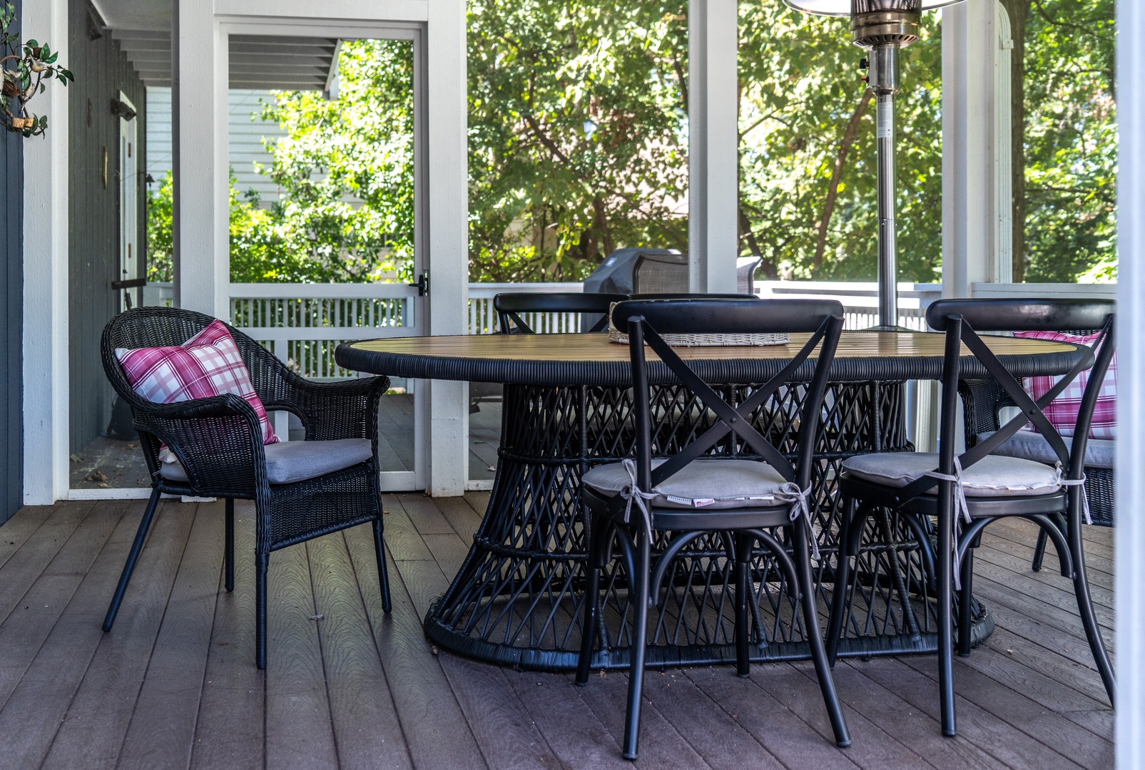 Enjoy a meal on the screened-in porch