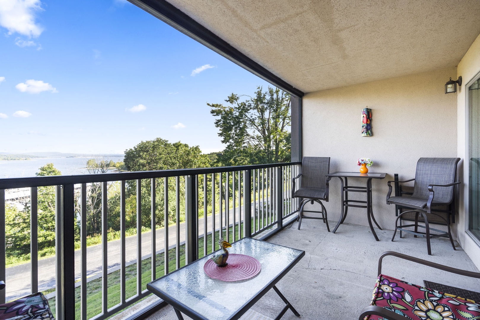 Lounge or dine with gorgeous lake views on the back deck
