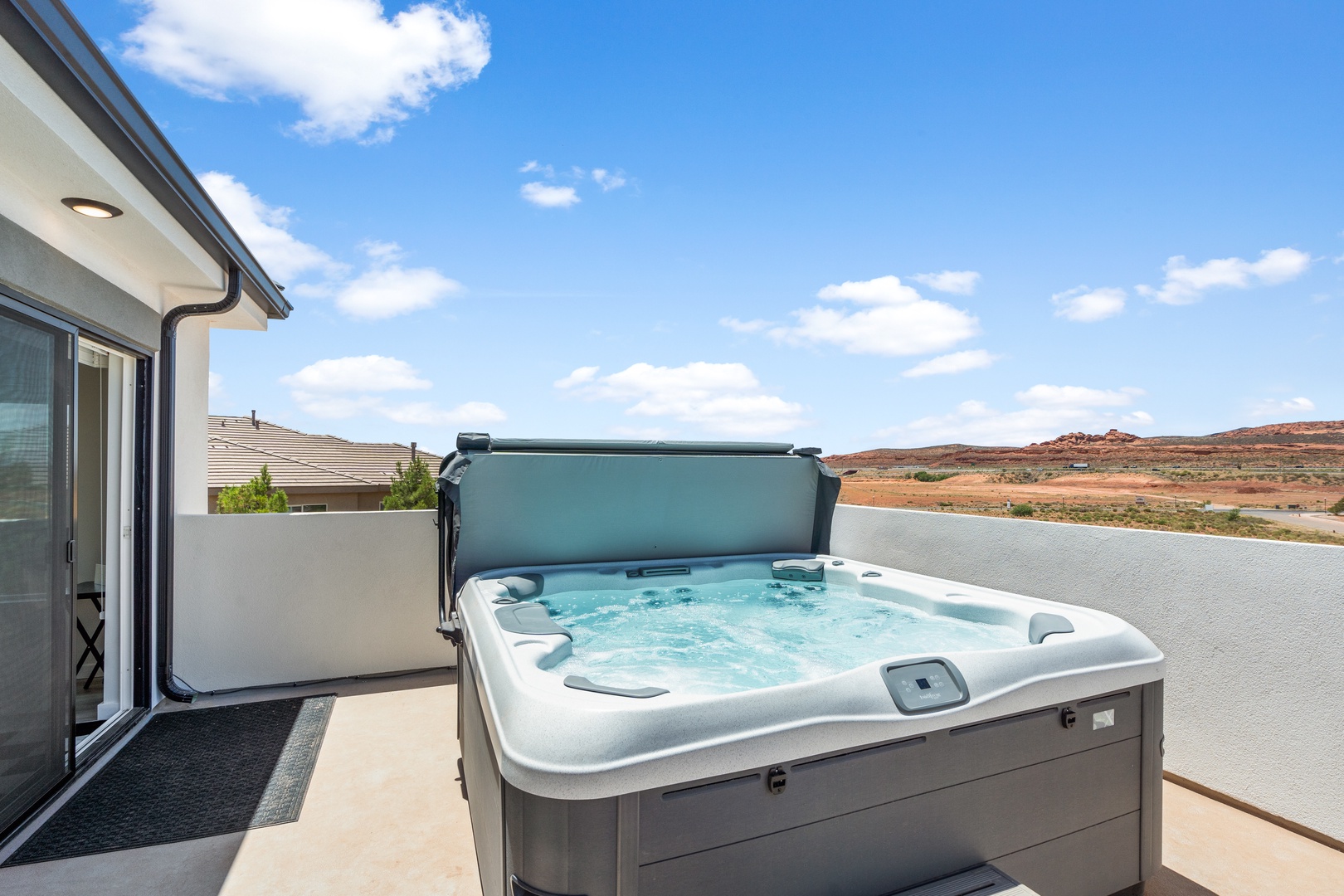 Bask in bubbling bliss with stunning views in your very own hot tub