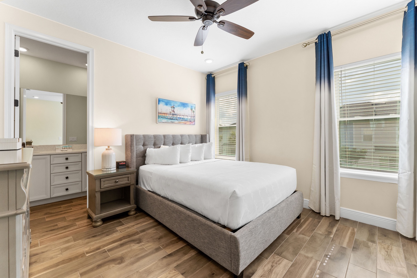 Bedroom 1 with queen bed, Smart & cable TV, and ensuite