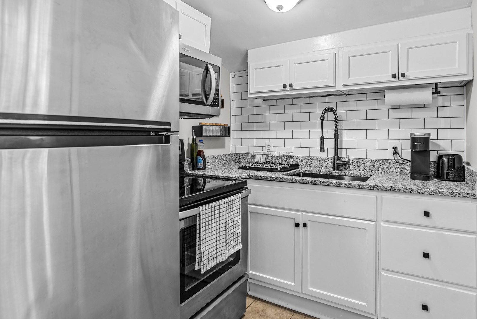 The quaint kitchen is well-equipped for your visit to Athens