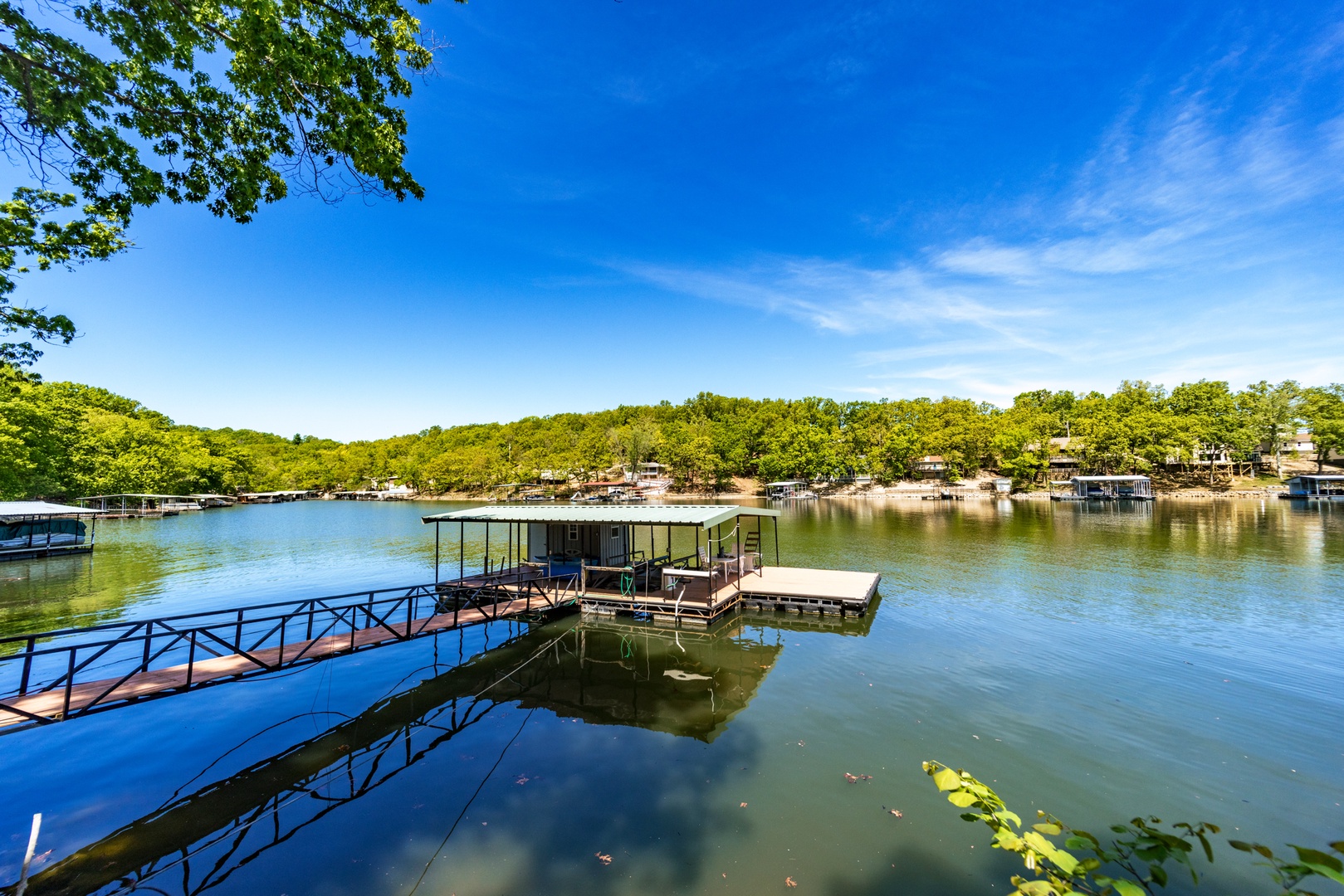 Try out your sea legs on the spacious private dock with boat slip available