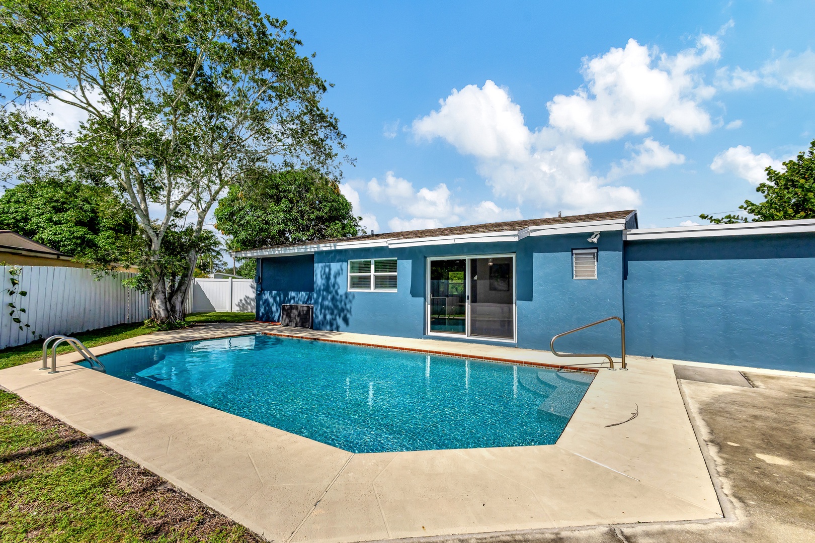 Back yard with private pool and outdoor seating