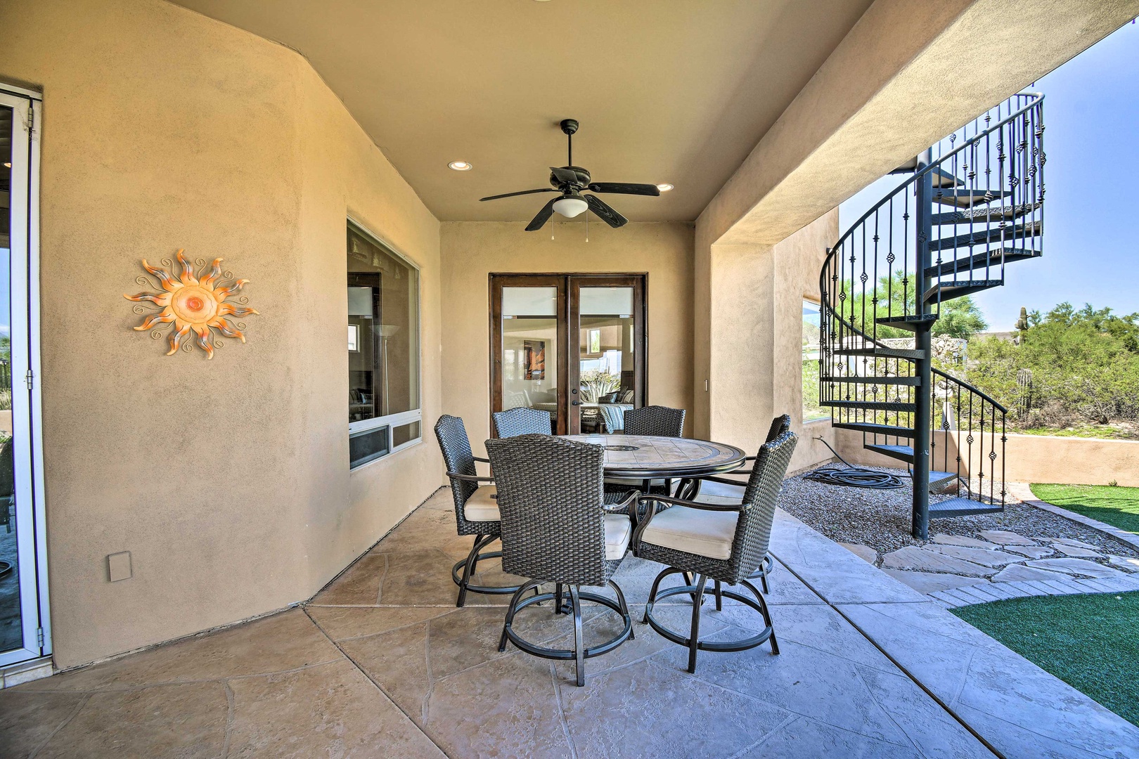 Enjoy a meal or an evening beverage in the shade on the spacious patio