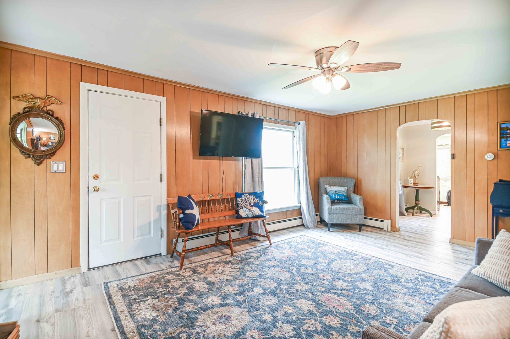 Living room with Smart TV and full size sofa sleeper