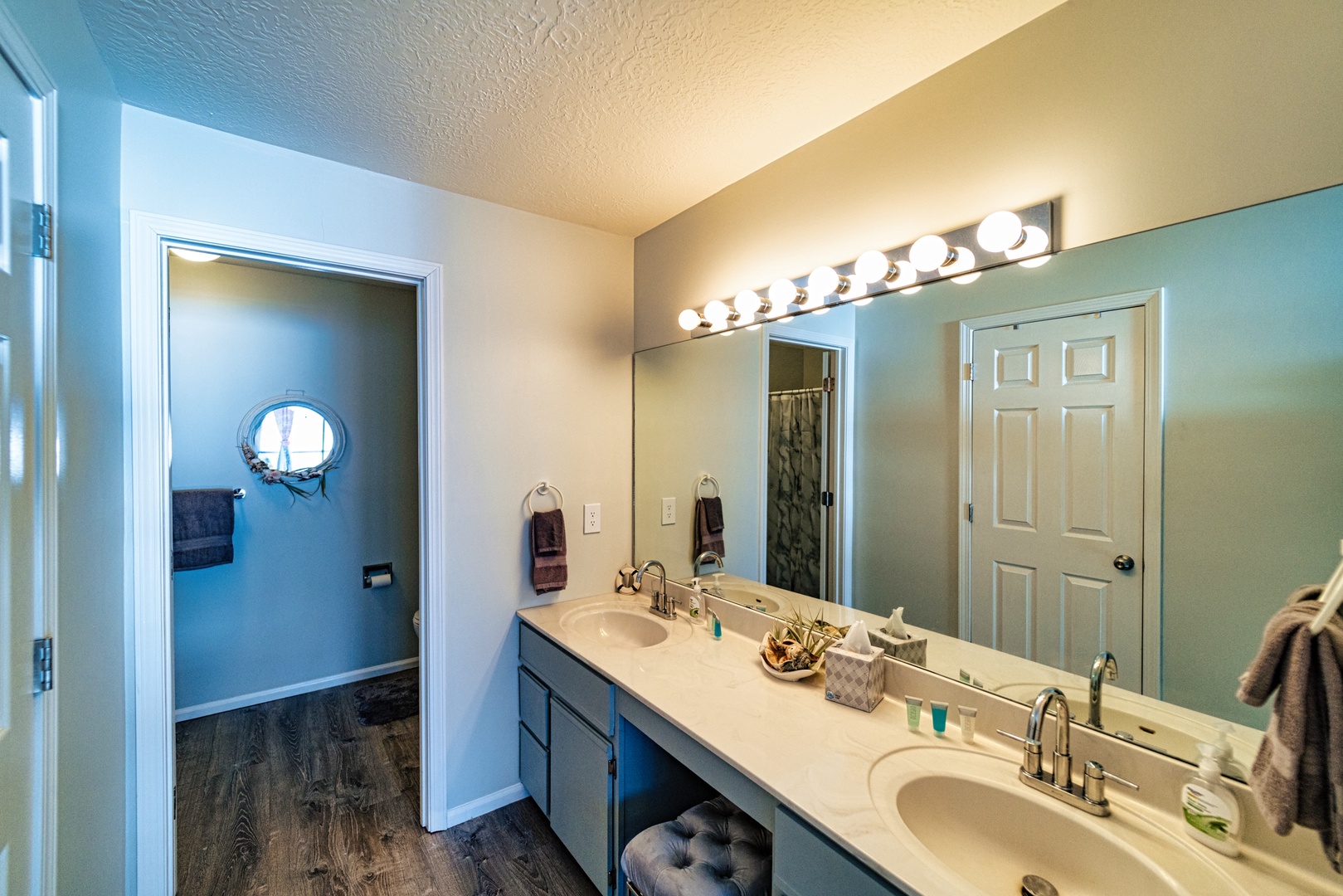 The queen ensuite includes a double vanity, shower/tub combo & closet