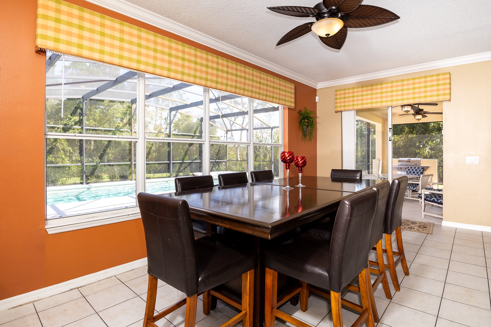An additional dining table is available off the kitchen, with seating for 8