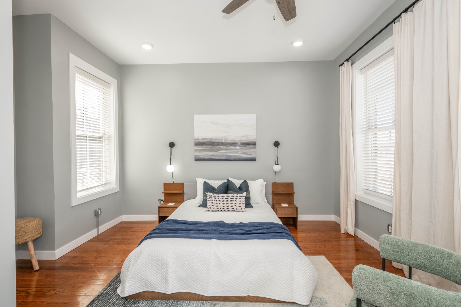 This serene queen suite features a private ensuite bath & Smart TV