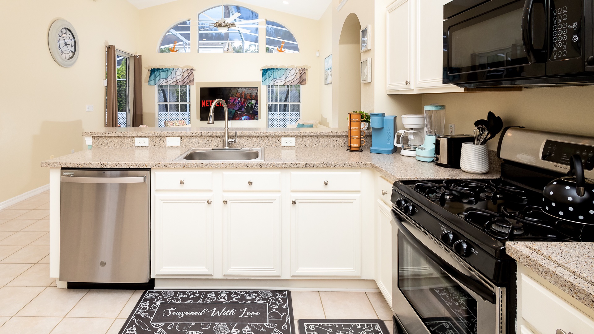 The updated kitchen offers loads of space & all the comforts of home