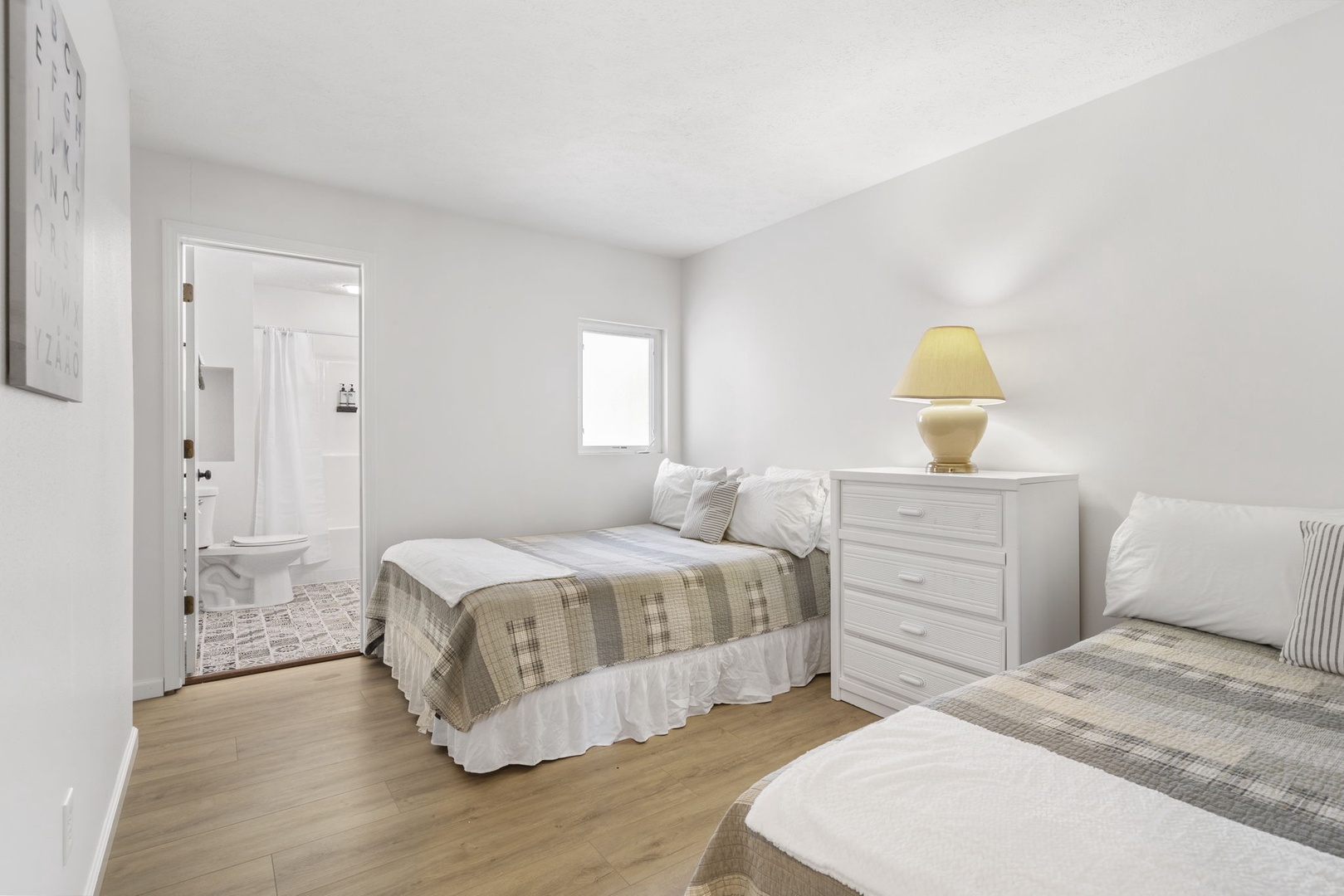 Unit 41: This 2nd floor suite includes a pair of full beds & private en suite
