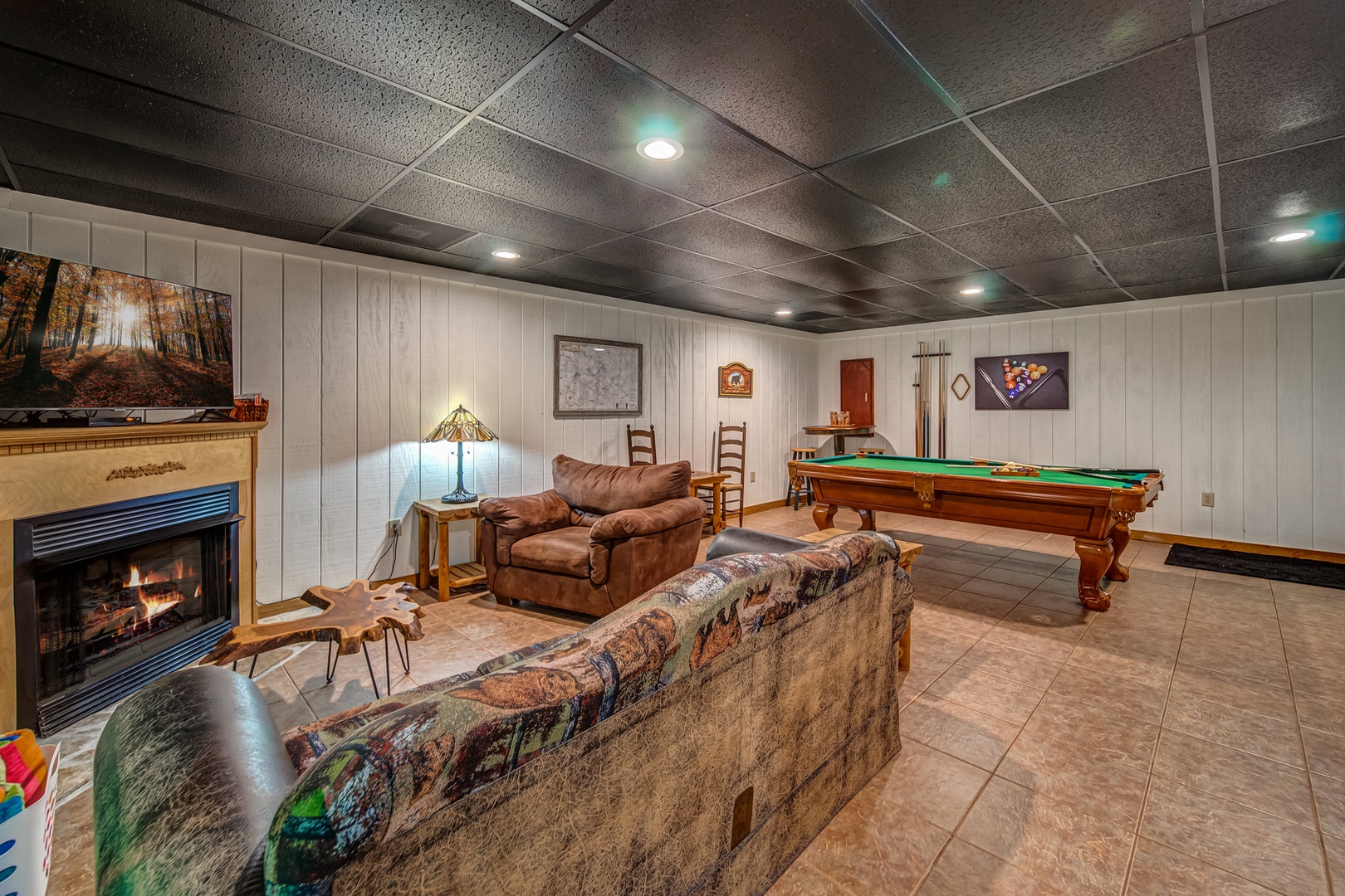 You may also retire to relax downstair, where there is another queen sized sleeper sofa.  Enjoy a round of pool, darts, board games, or bring your gaming console for endless gaming