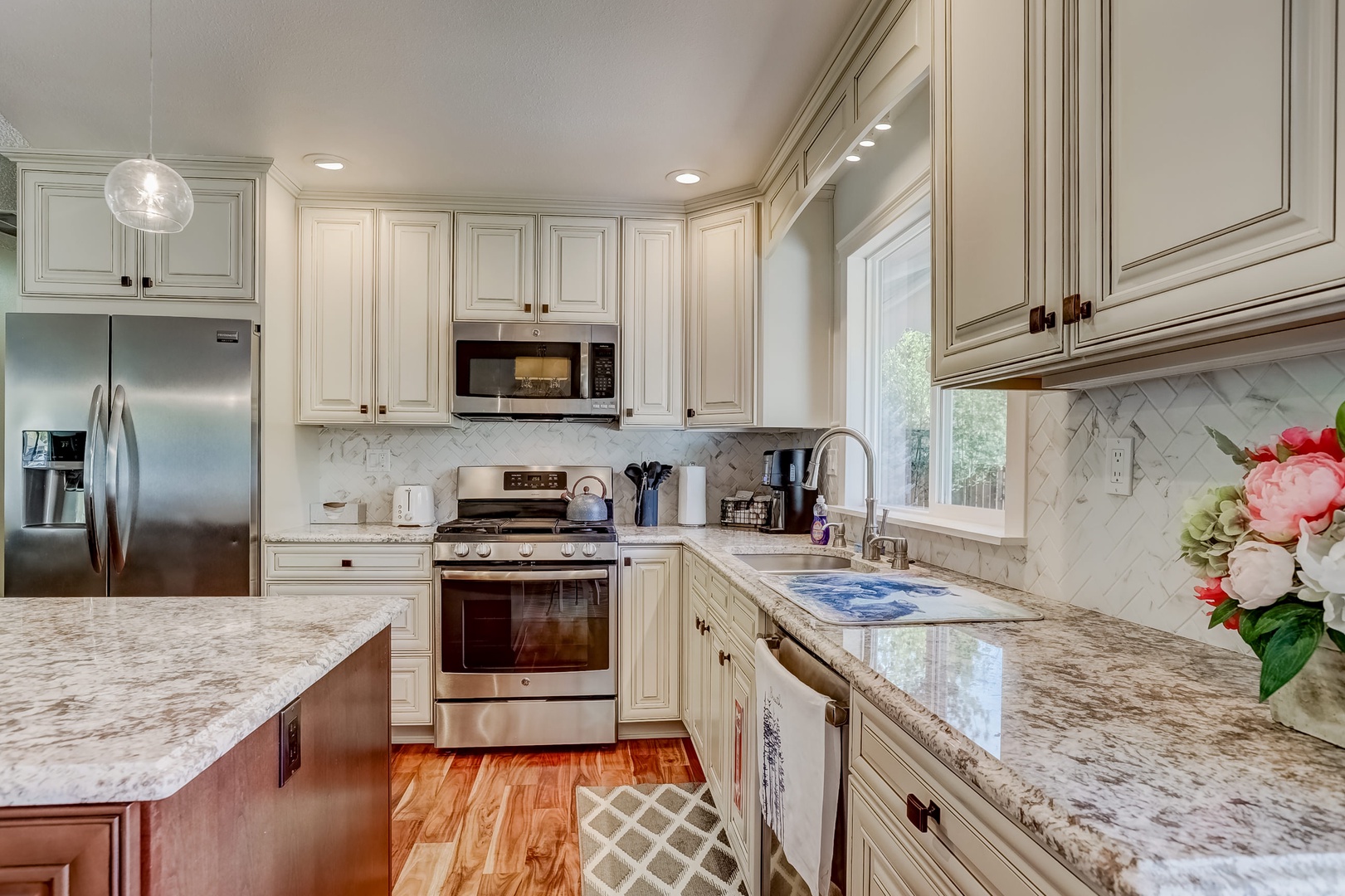 Kitchen with toaster, drip coffee maker, French press, blender, and more