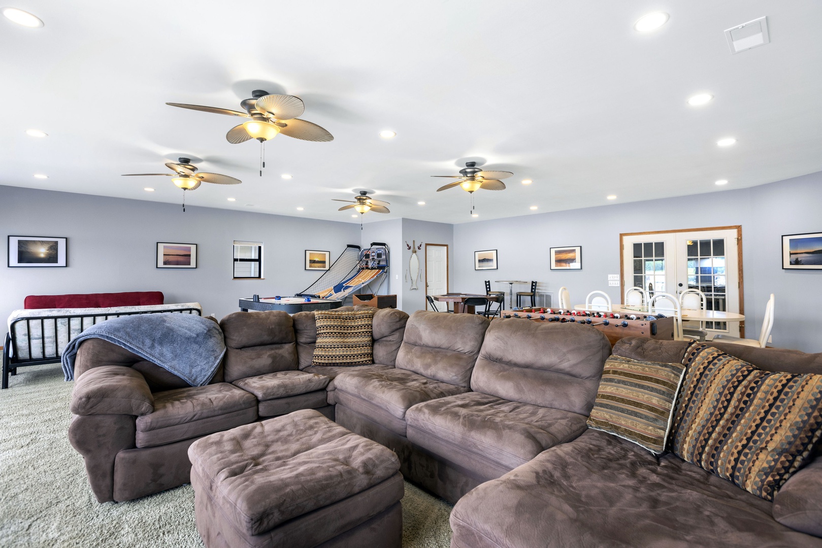 Spend your days lounging, gaming, & laughing together in the main level game room!