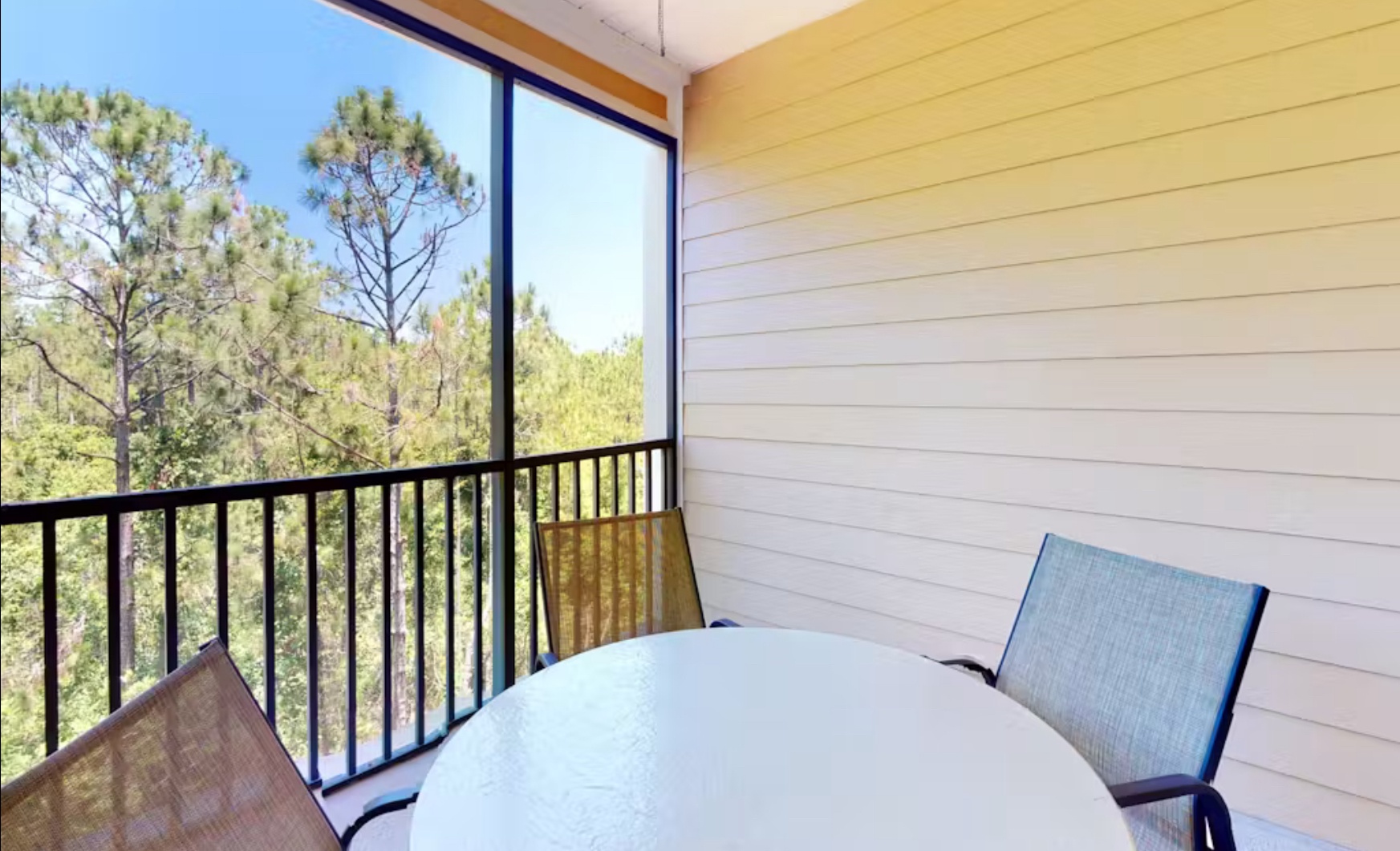 Enjoy morning coffee or dine alfresco on the breezy screened balcony