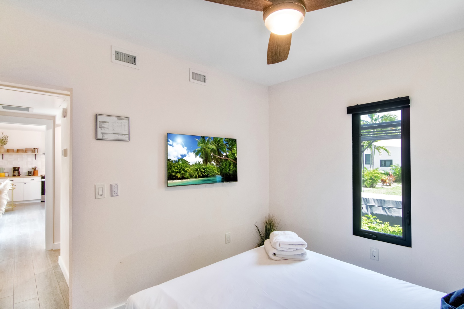 Main House: Bedroom 1 with queen bed, and Smart TV