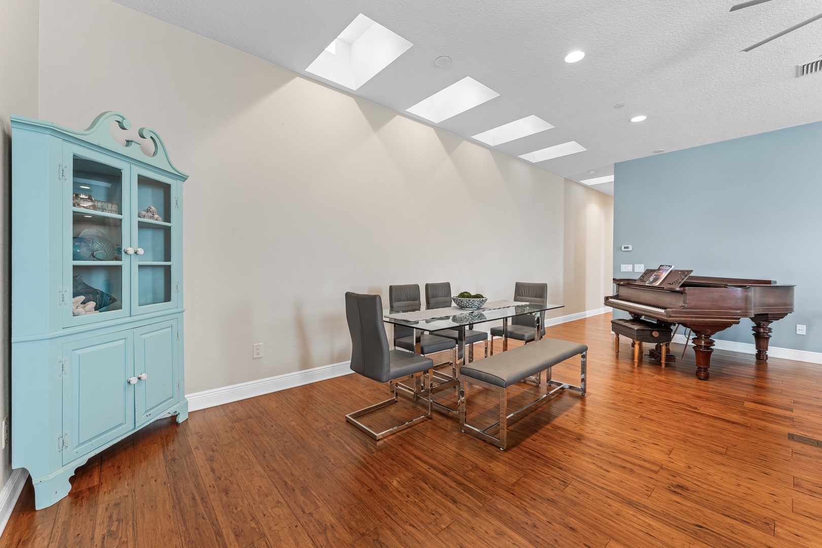 Dining area with table and seating for 8