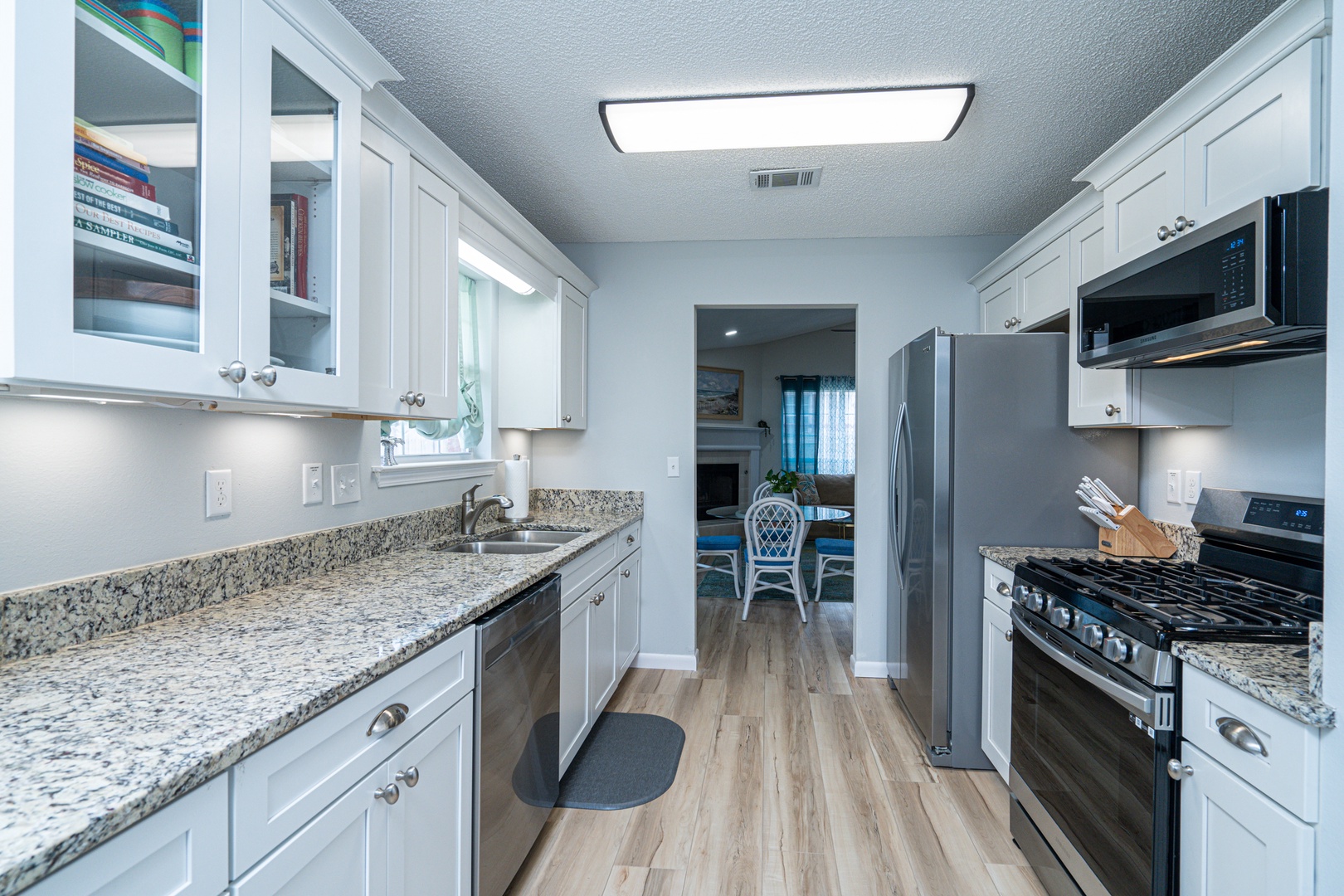 The breezy kitchen offers ample space & all the comforts of home