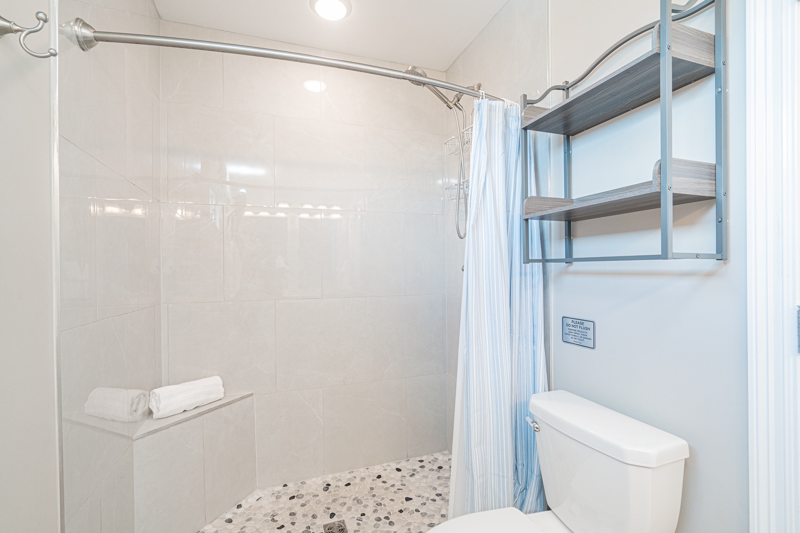 The 2nd floor full bathroom offers a dual vanity & walk-in shower