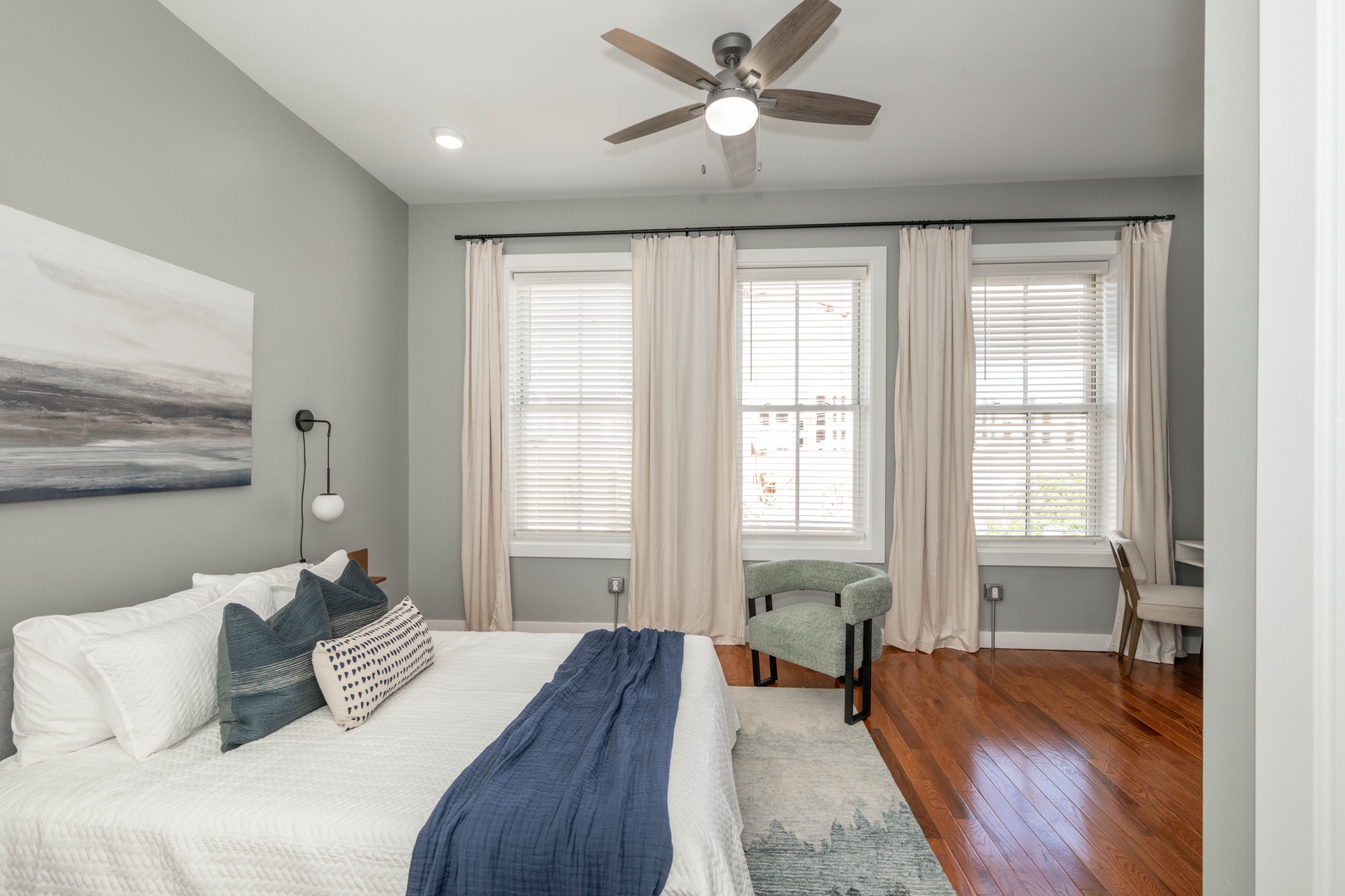 This serene queen suite features a private ensuite bath & Smart TV