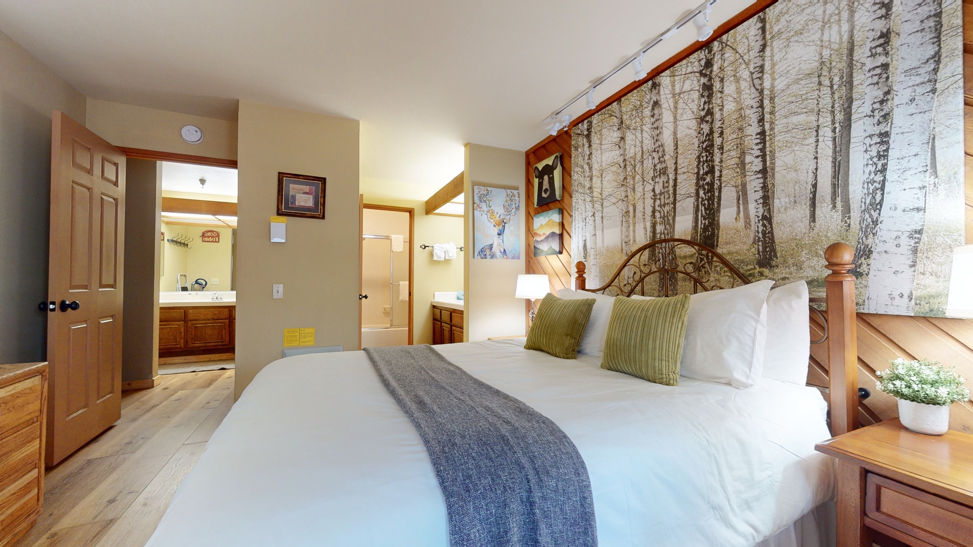 Bedroom 2 with Queen bed, Twin bed, balcony access, and en-suite