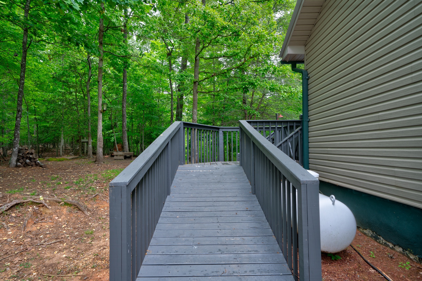 Enjoy ample parking in the driveway & a ramp for wheelchair access