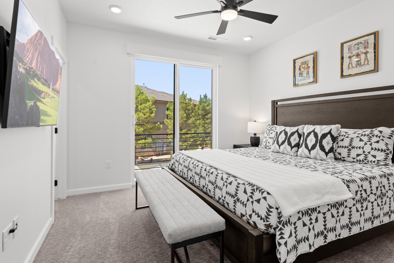 This tranquil king balcony suite features an ensuite bath & smart TV