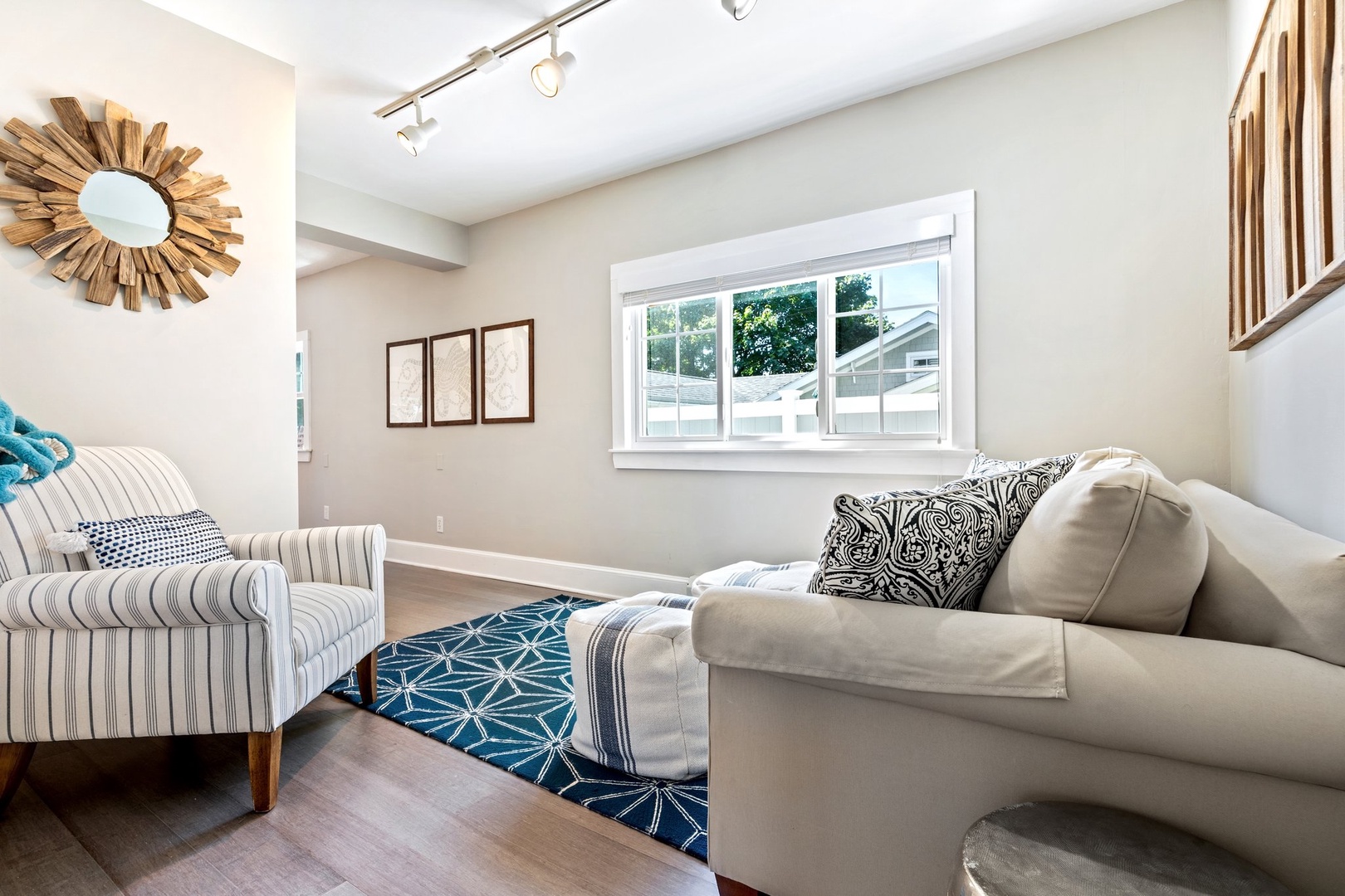 Relax in this cozy first-floor bonus living room with a sleeper sofa