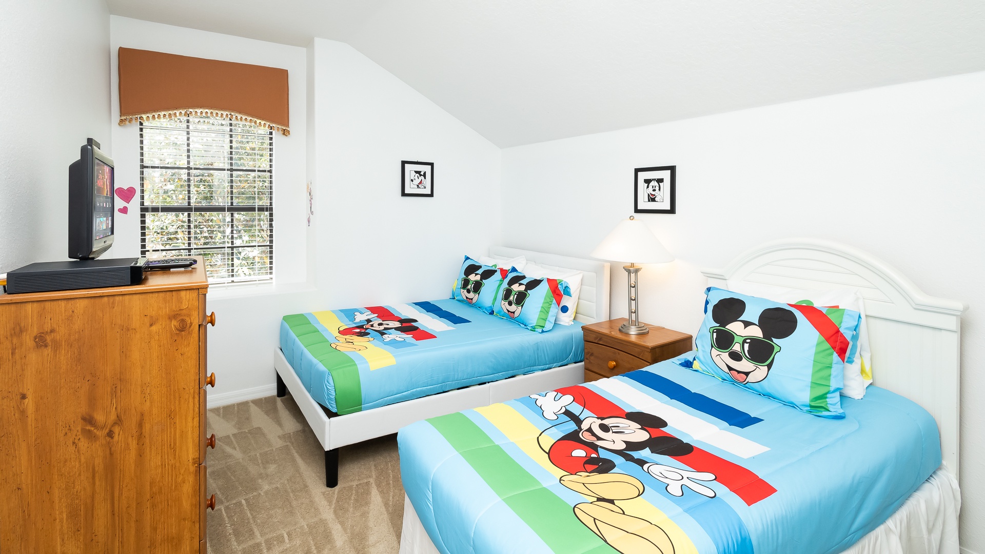 Bedroom 4 Mickey Mouse themed with full bed, twin bed, and Smart TV
