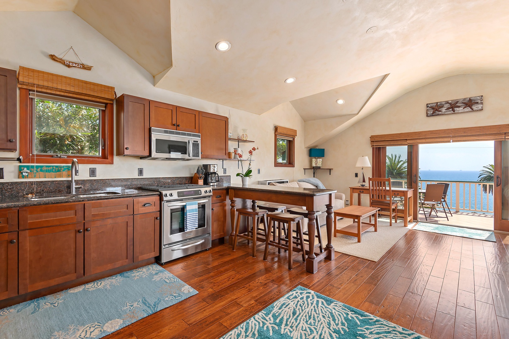 Kitchen with drip coffee maker, toaster, and eat in counter