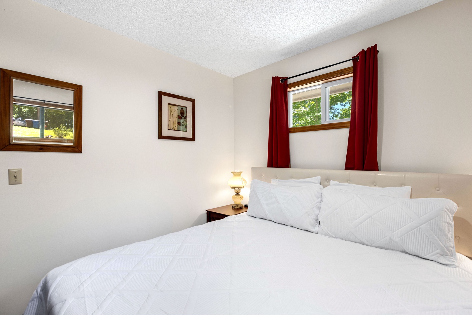 The 2nd bedroom retreat on the main floor, with a king bed & Smart TV