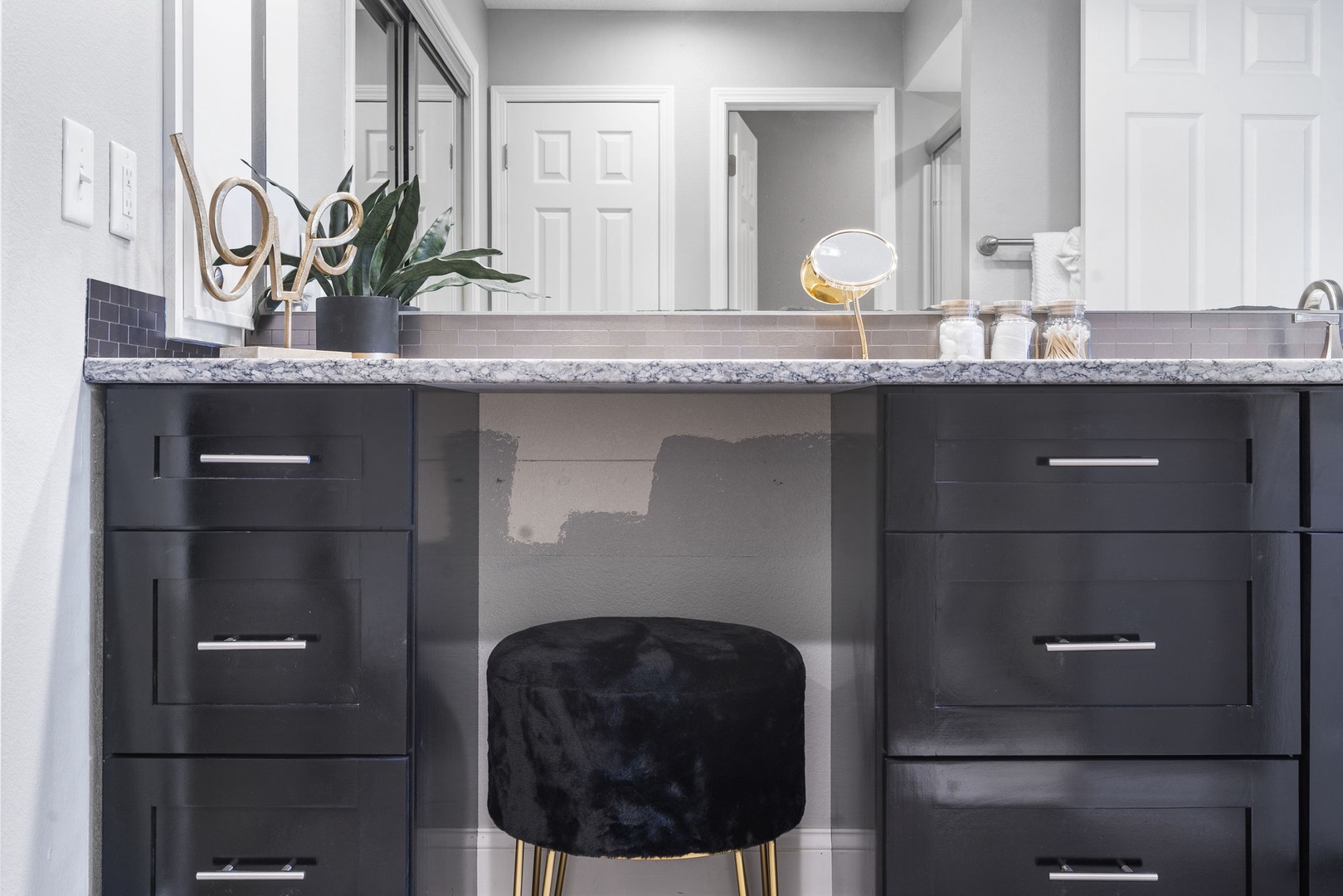 The second ensuite includes an oversized vanity & walk-in shower