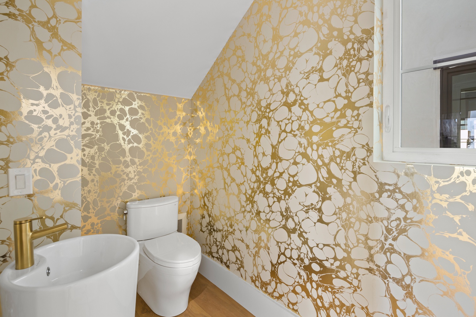 A chic powder room is available on the first floor