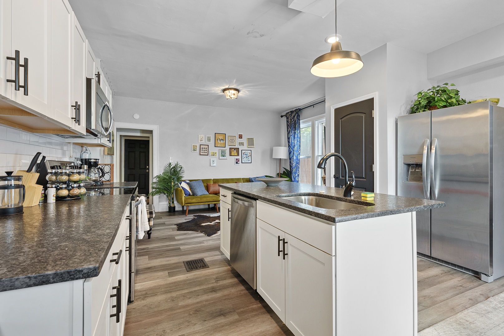 Apartment 1164’s open, airy kitchen offers ample space & every home comfort