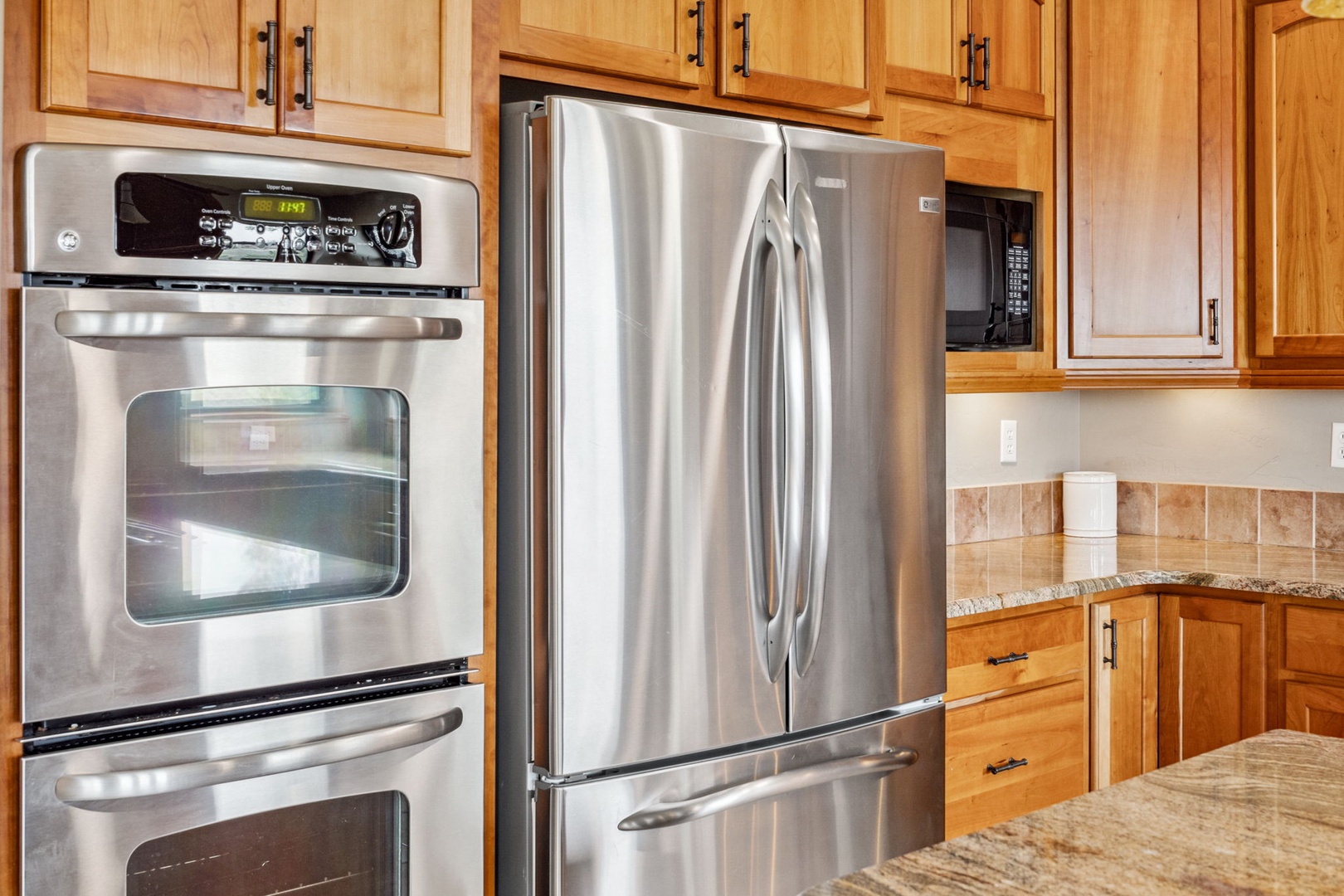 The open, airy kitchen offers ample space & all the comforts of home