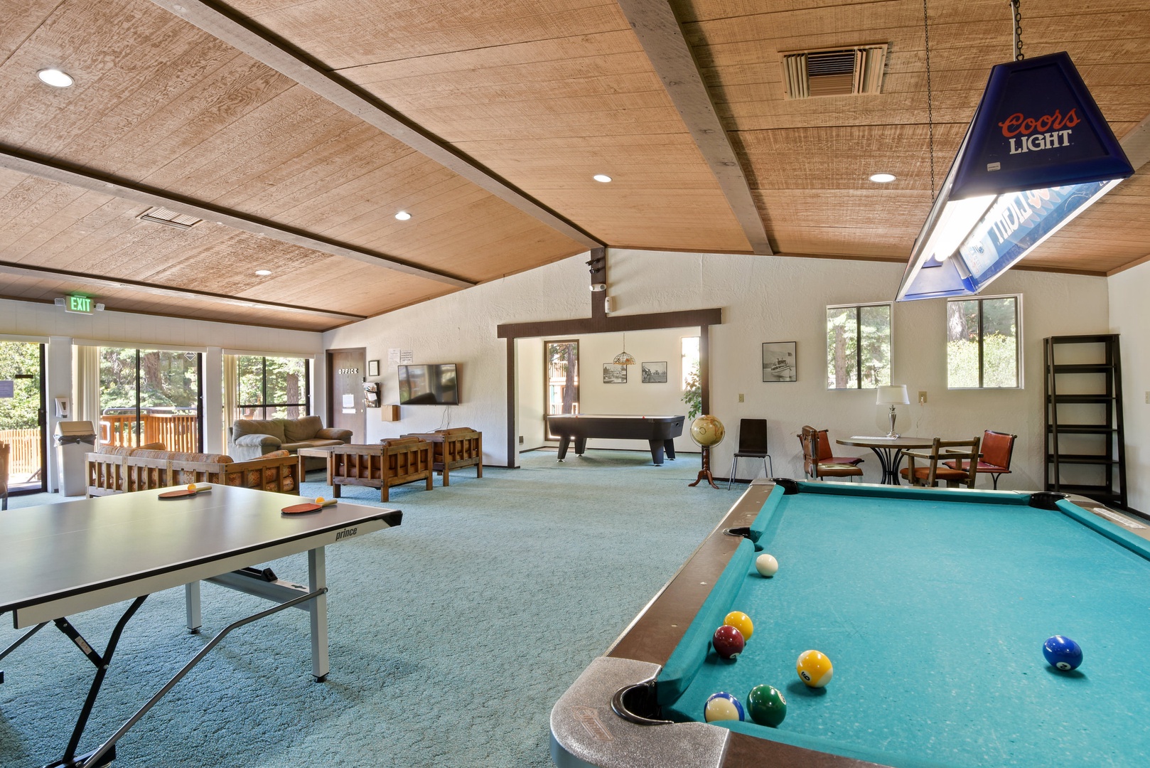 Condo clubhouse with pool table and ping pong table