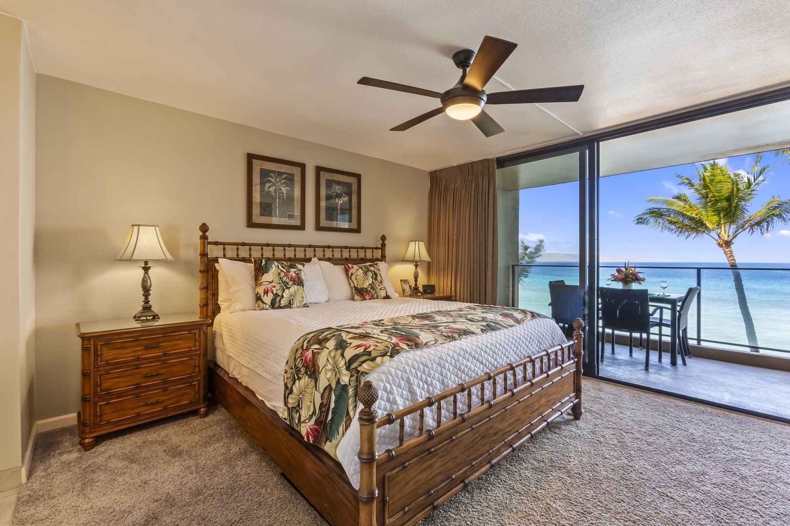 Bedroom with cal-king bed, lanai access, and ensuite