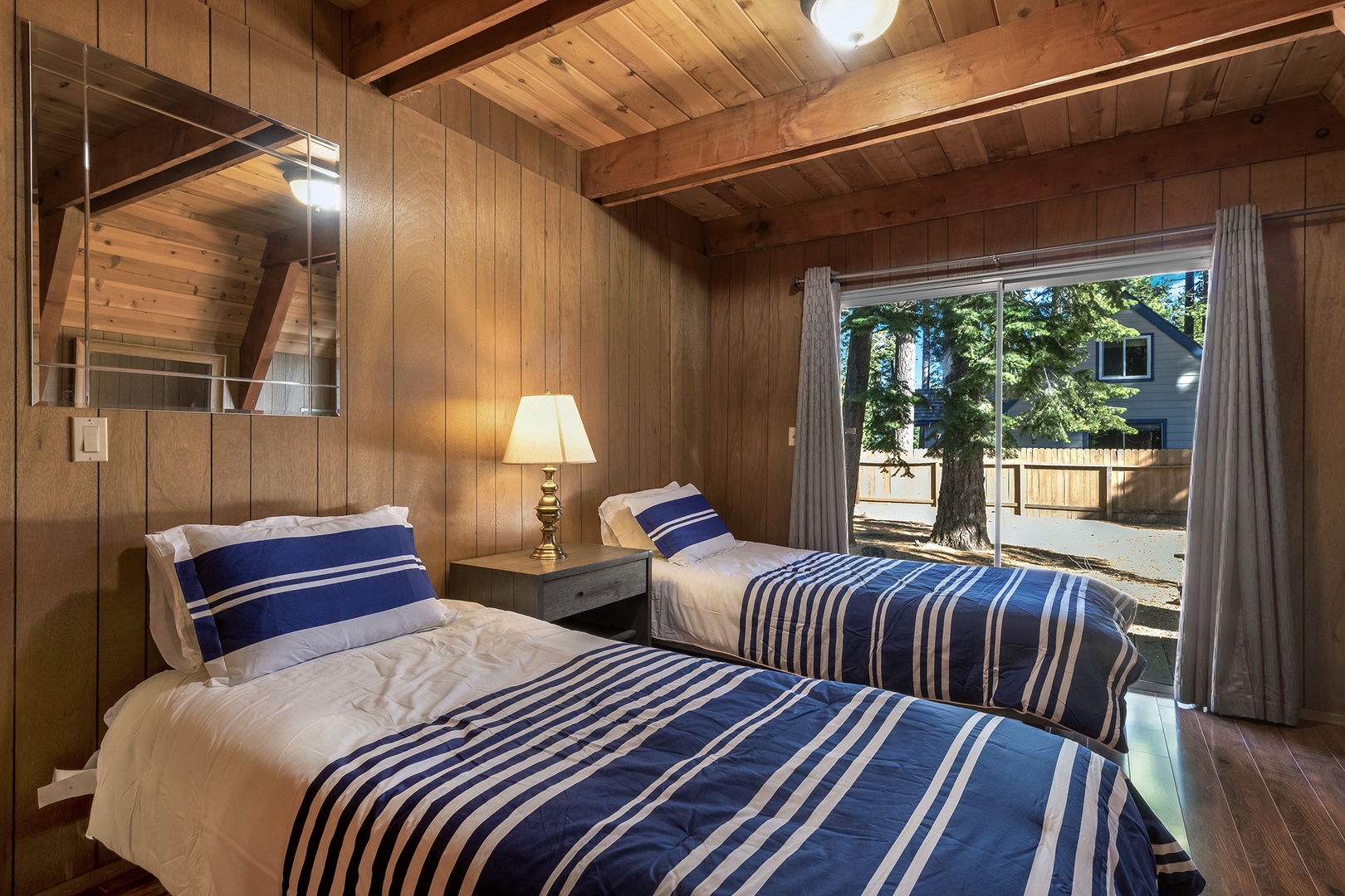 Recharge in the second bedroom retreat, featuring 2 twin beds