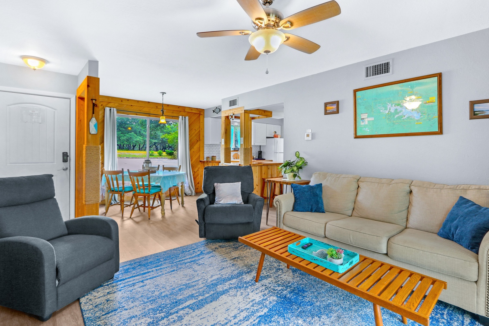 The bright & inviting living area is perfect place to relax after a day of fun