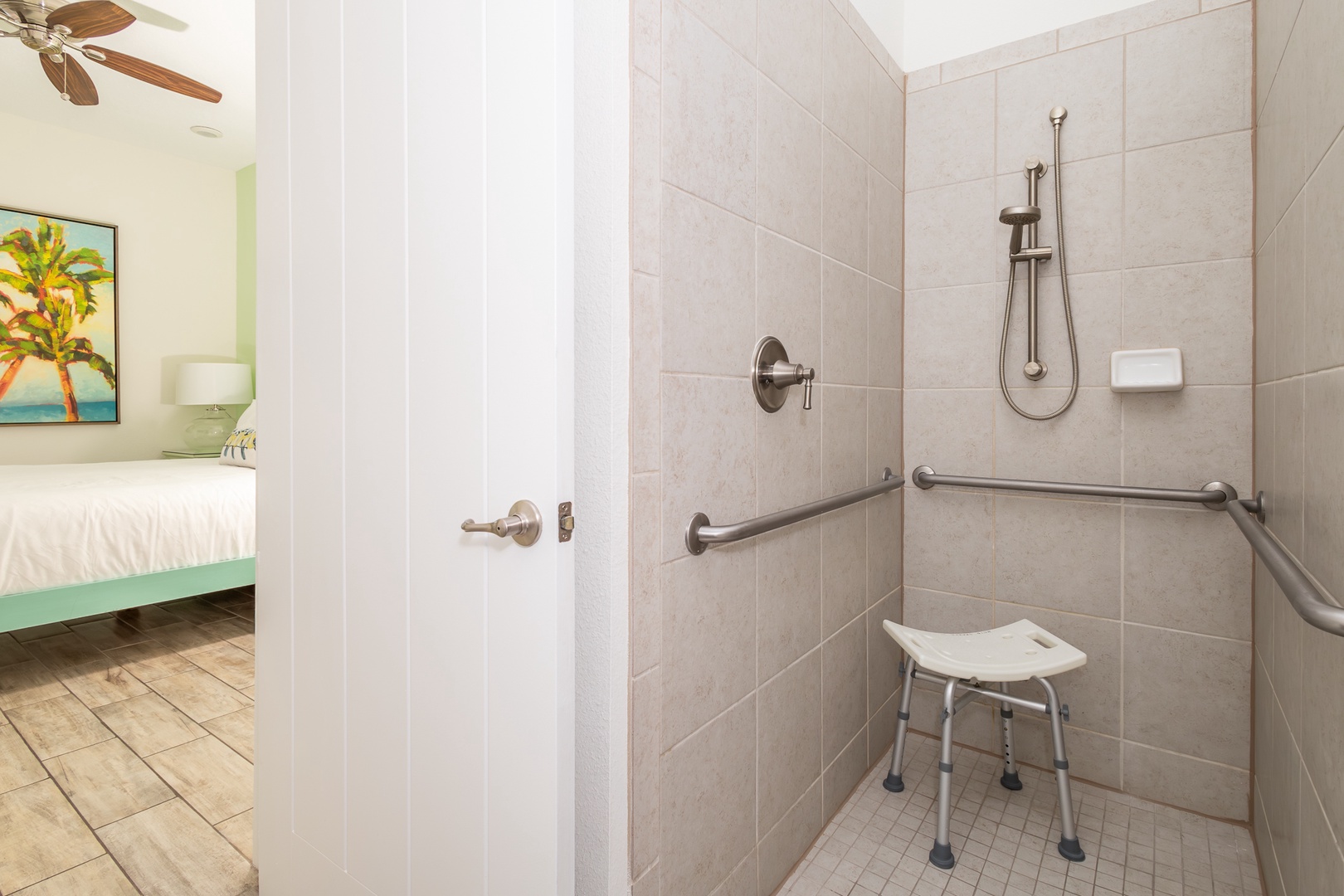 Wash up in this first floor handicap accessible ensuite, featuring a single vanity & roll-in shower