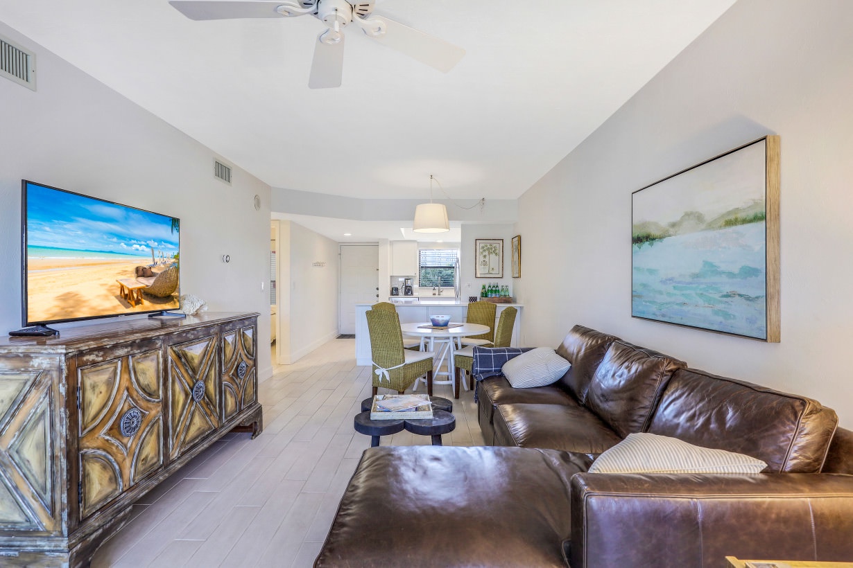 Open living space with, TV, and lanai